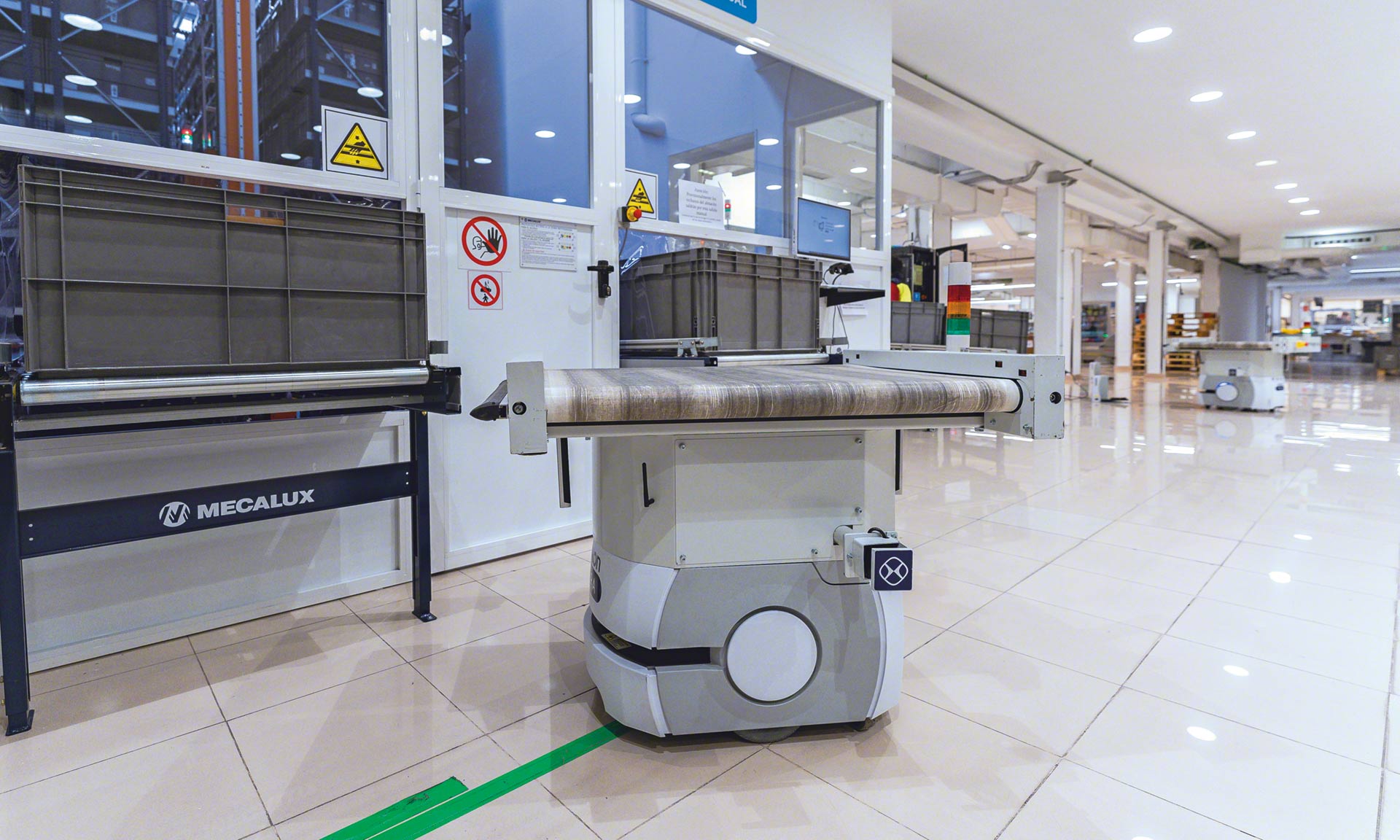 An AGV robot is an automated guided vehicle used in warehouses and production centers