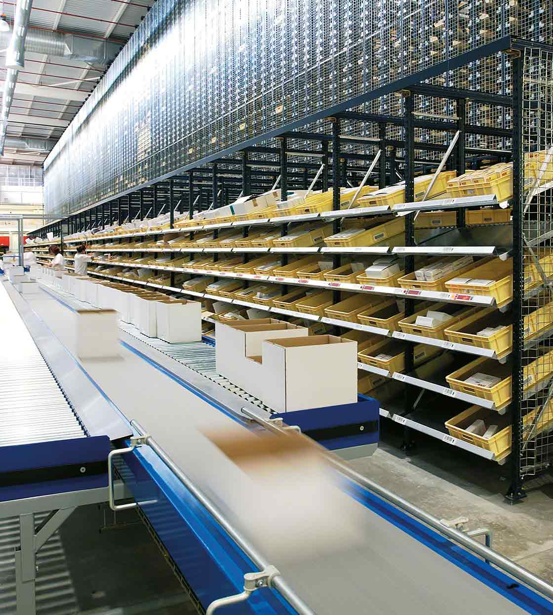 Overview of cardboard flow racking systems in a warehouse Overview of cardboard flow racking systems in a warehouse