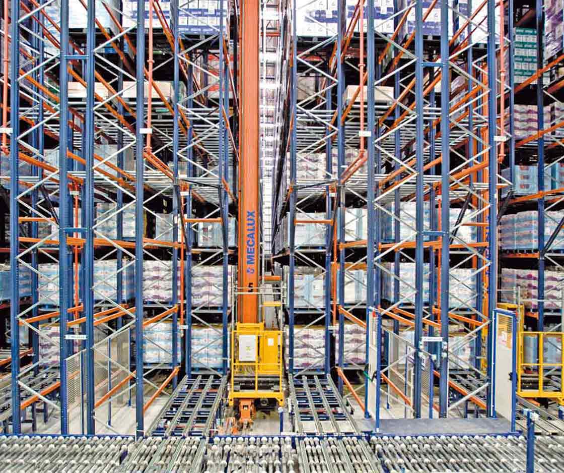 Stacker crane working in an automated warehouse Stacker crane working in an automated warehouse