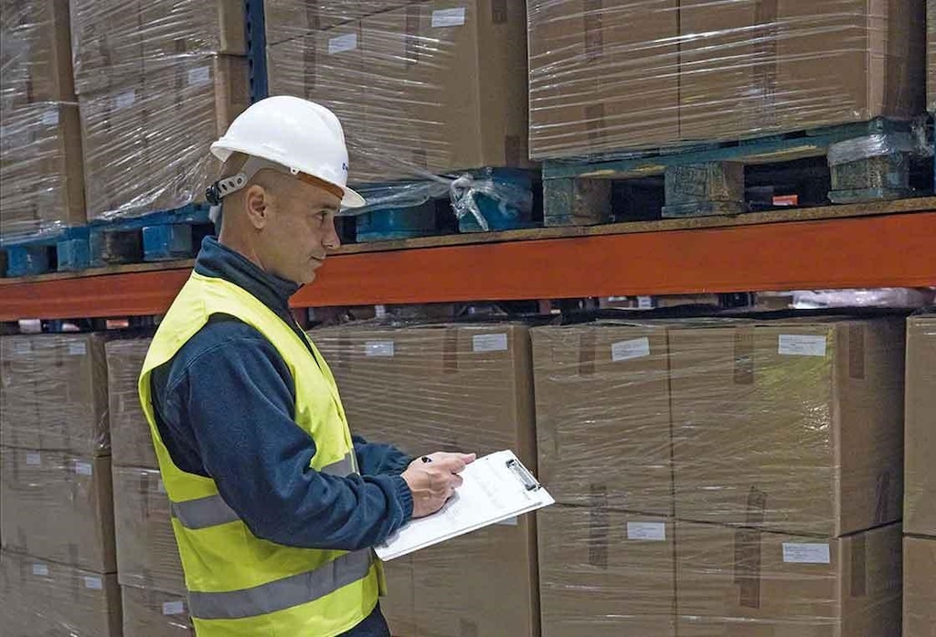 Warehouse worker concerned about an inventory problem