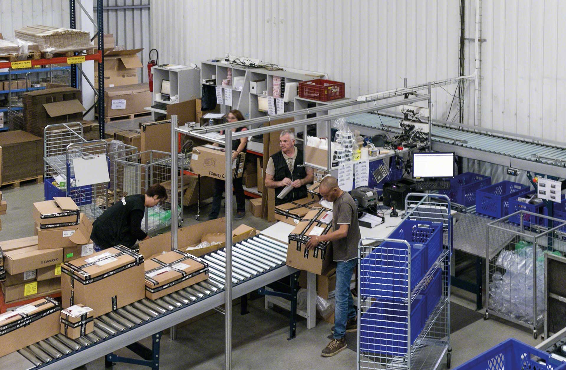 Warehouse workers preparing orders manually