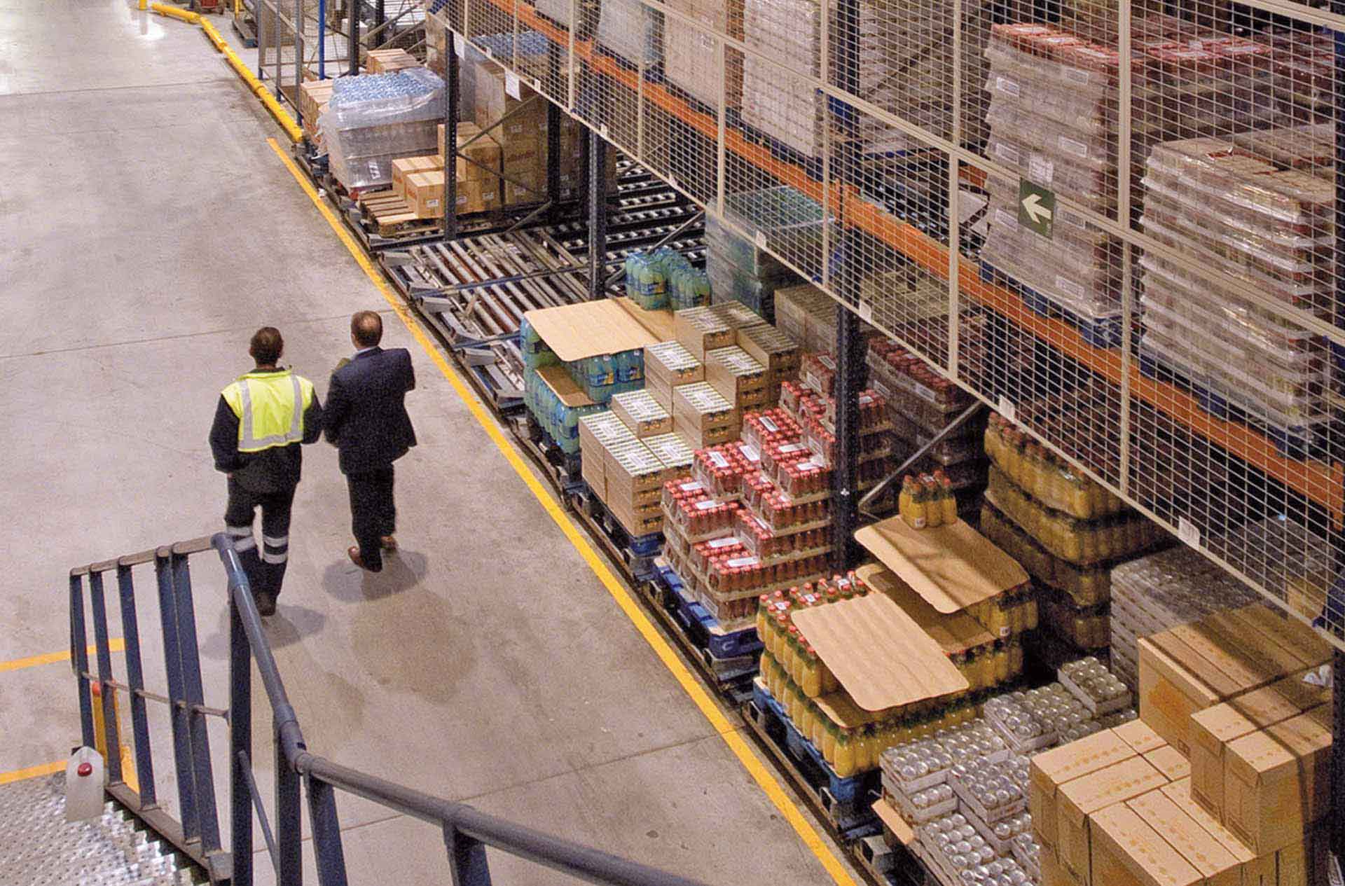 Workers walking and discussing the warehouse technologies of the future