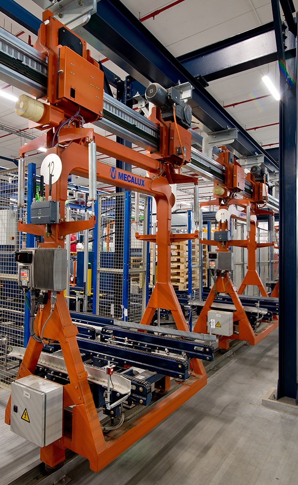 The electric monorail can reach 393 ft/min in straight sections, a higher speed than the conveyors achieve