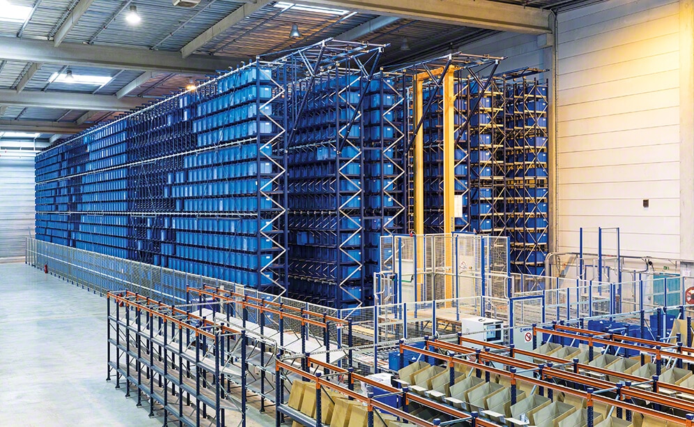 The miniload AS/RS for boxes comprises three aisles with double-depth racks on both sides that measure 141' long, 29’ high and have 15 levels