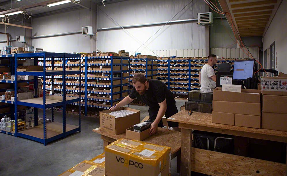 Operators walk through the warehouse picking up the SKUs for each order
