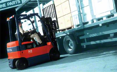 Forklift handling the goods from the side.