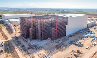 In a clad rack warehouse, the racks provide the building’s structural support