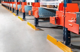 The front protectors show the operator the limit that the forklift must not surpass